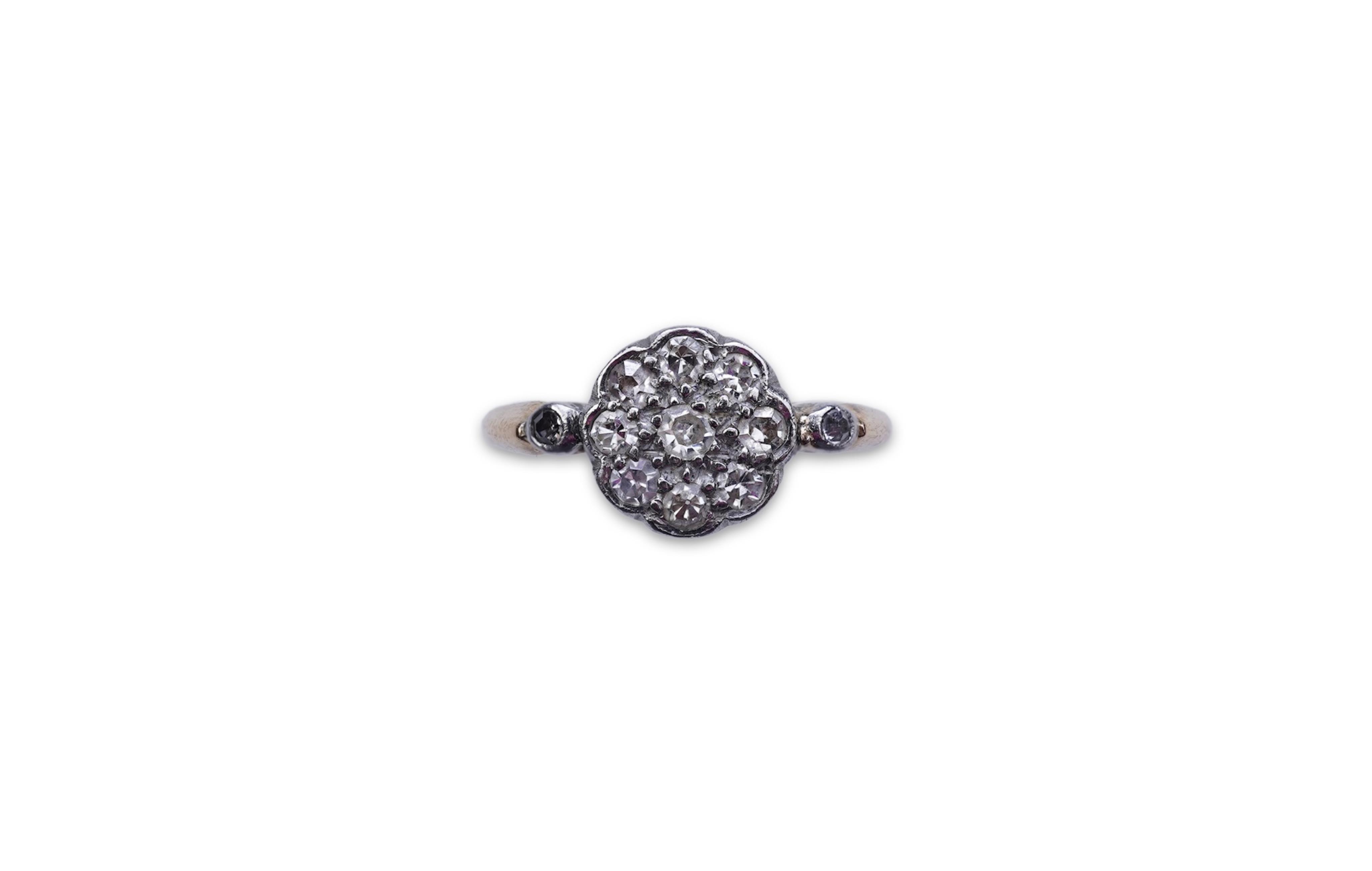 A diamond cluster ring, early 20th century